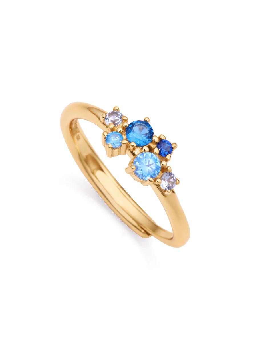 Anillo Trend de plata de ley bañado en oro con circonitas azules y blancas