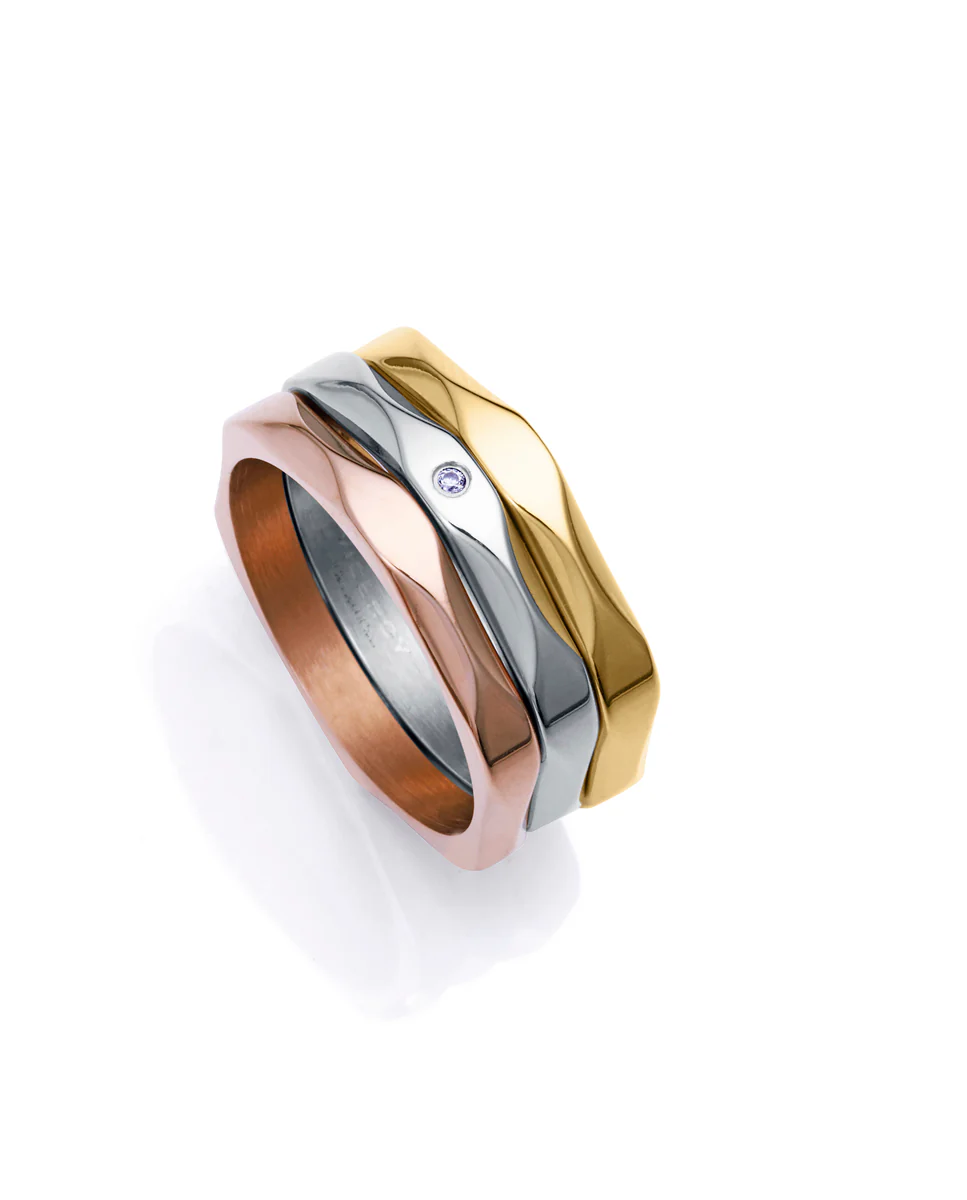 Tres anillos de mujer  de acero en tres tonos
